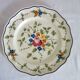 12 anciennes assiettes à dessert Longchamp décor fleuri