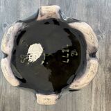 Antique ceramic vase by De Bruyn with floral decoration.