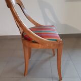 Gondola-style empire chairs