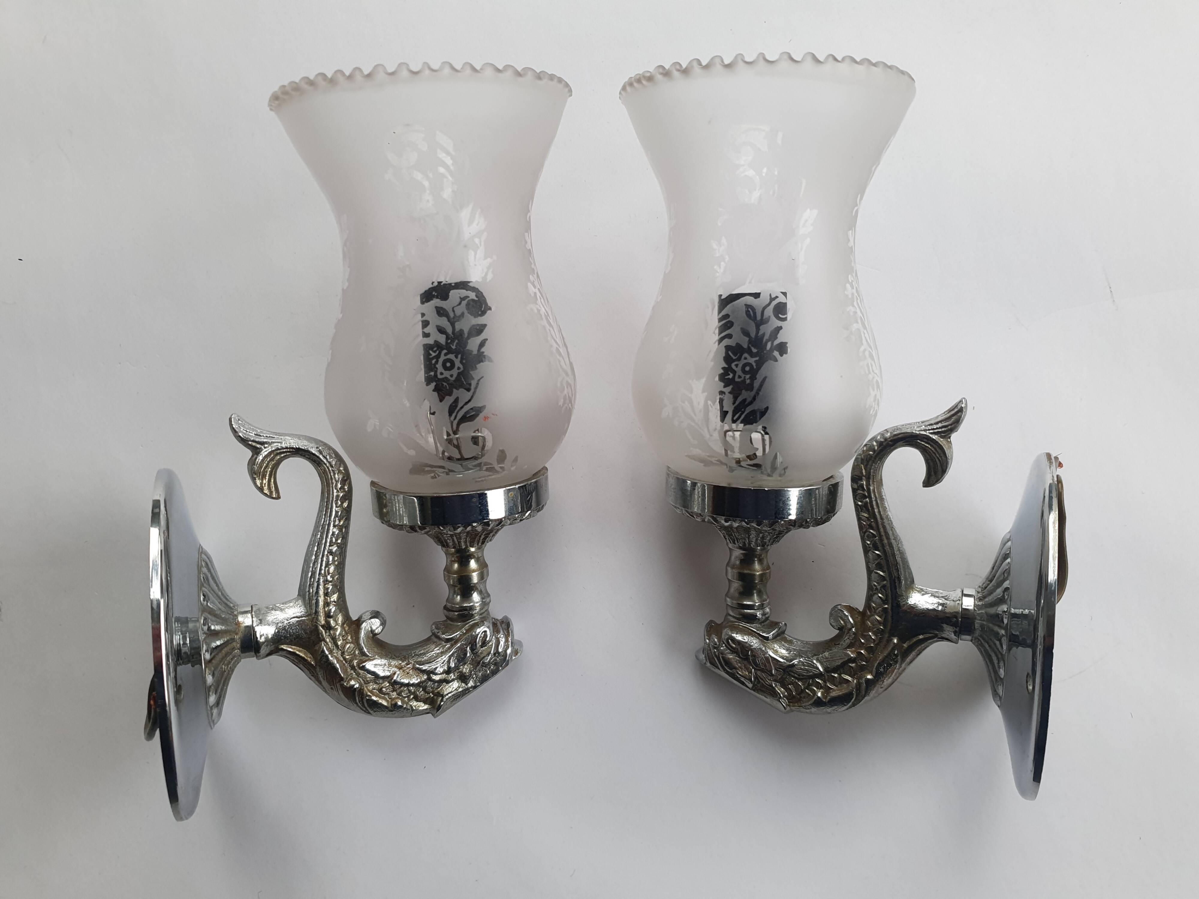 Pair of vintage chrome wall sconces