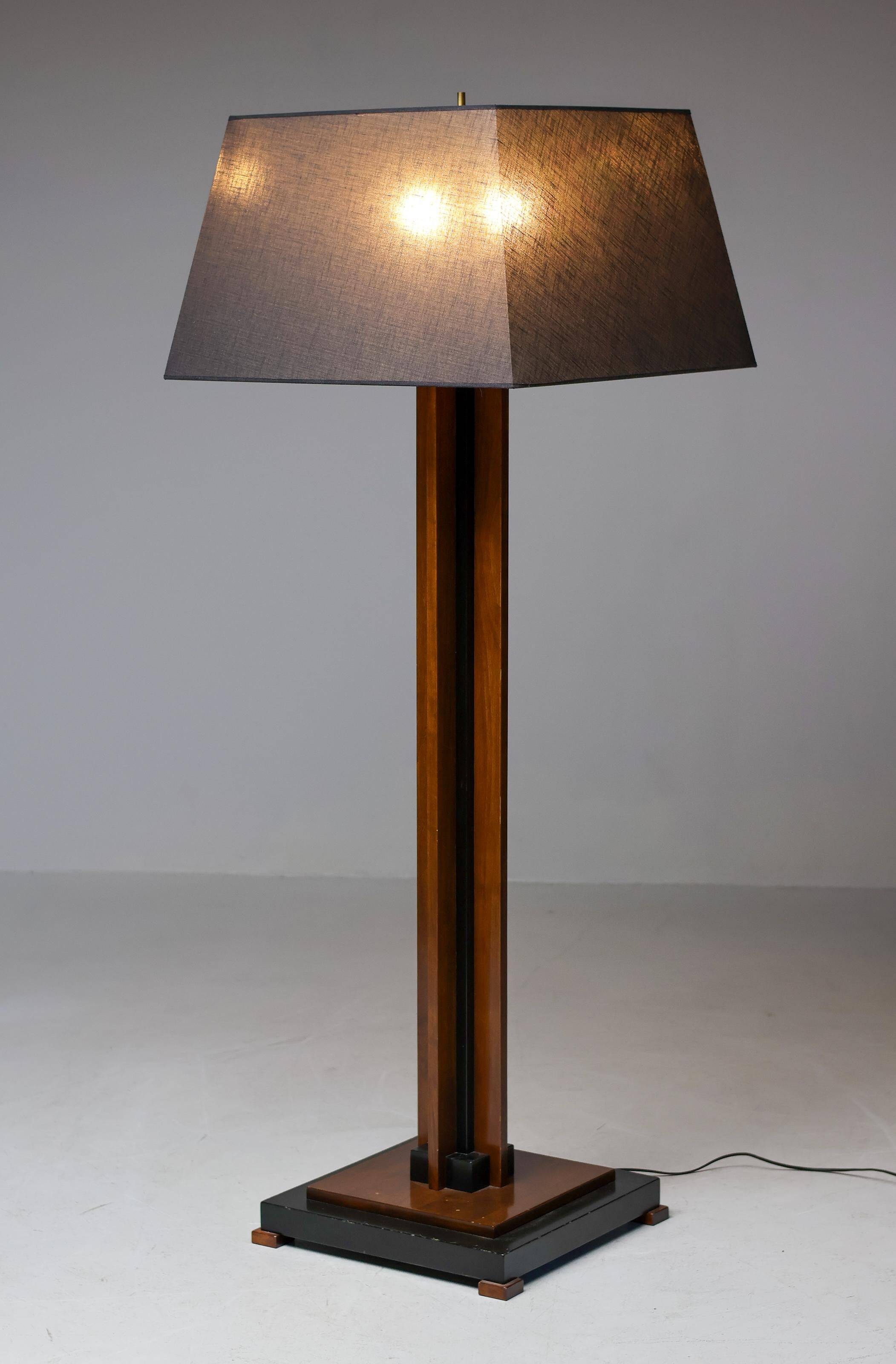 Amsterdam School floor lamp in partially ebonised cherry with a black linen shade.