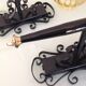 Pair of vintage iron and smoked glass