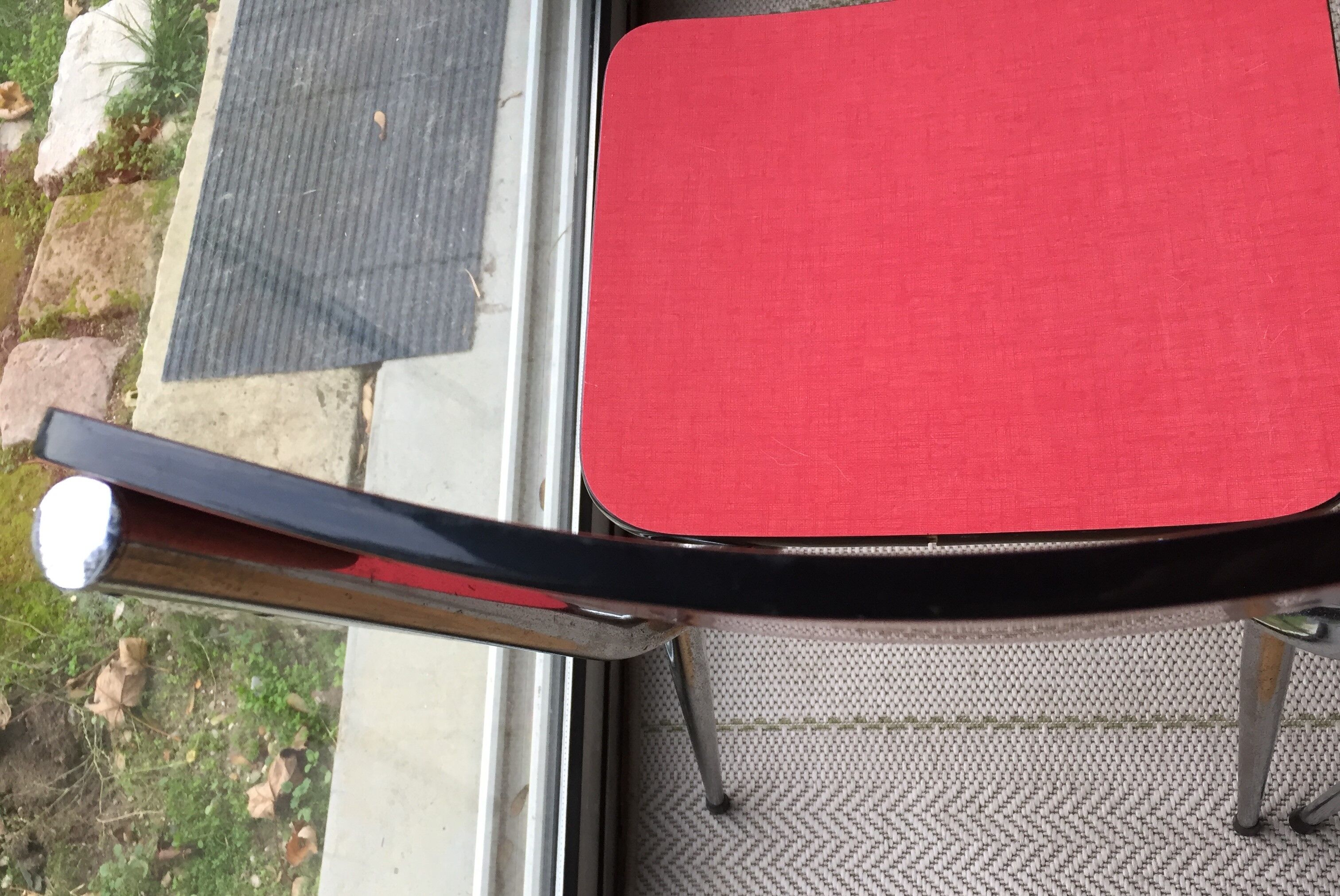 Table set and 2 vintage vintage pale red formica chairs