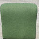 Green armchairs designed by Étienne Fermigier