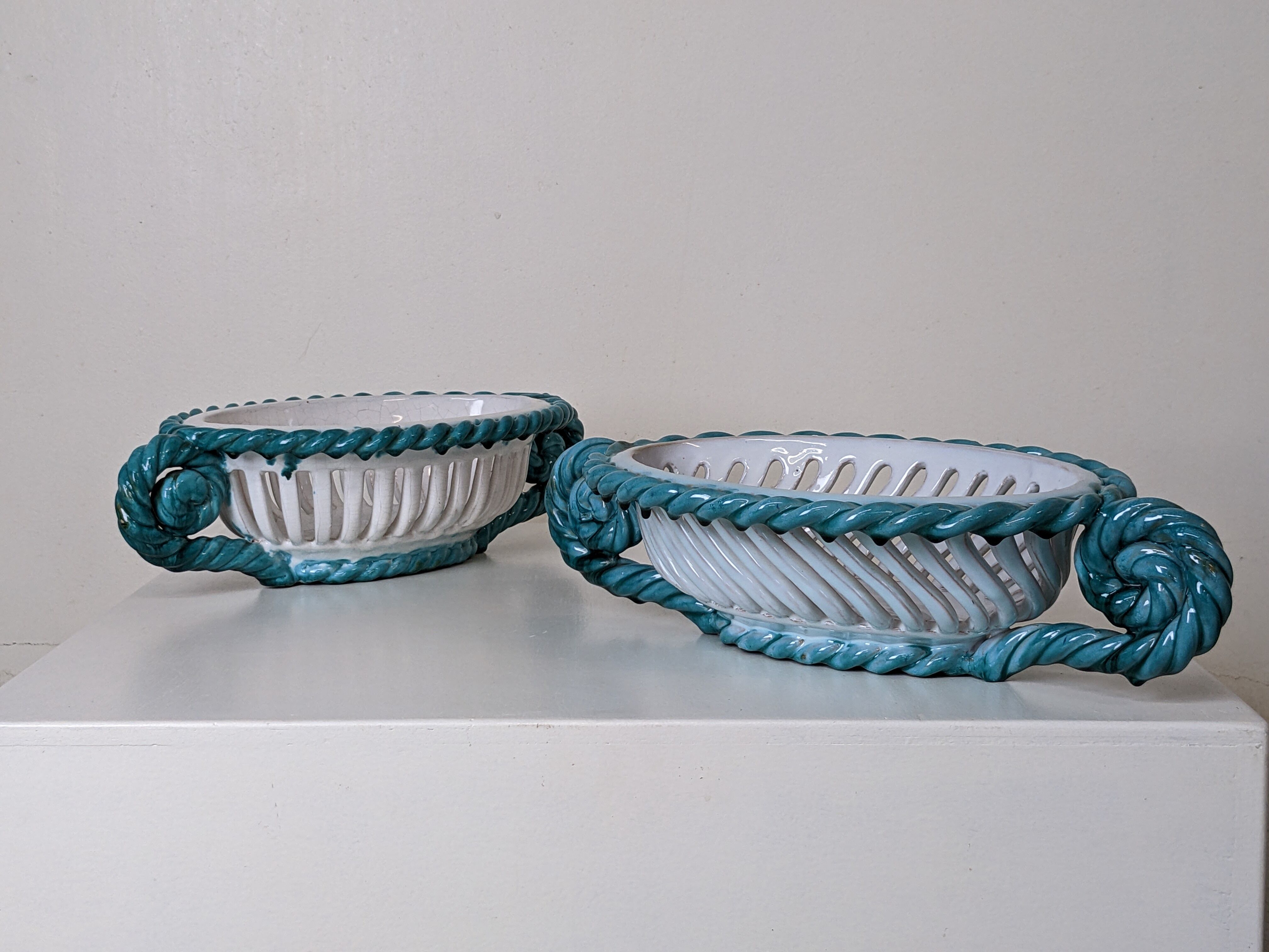 Set of 2 twisted earthenware fruit baskets by Sainte Radegonde, 50s