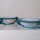 Set of 2 twisted earthenware fruit baskets by Sainte Radegonde, 50s