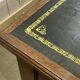 Large English flat desk in mahogany with leather top, early 20th century