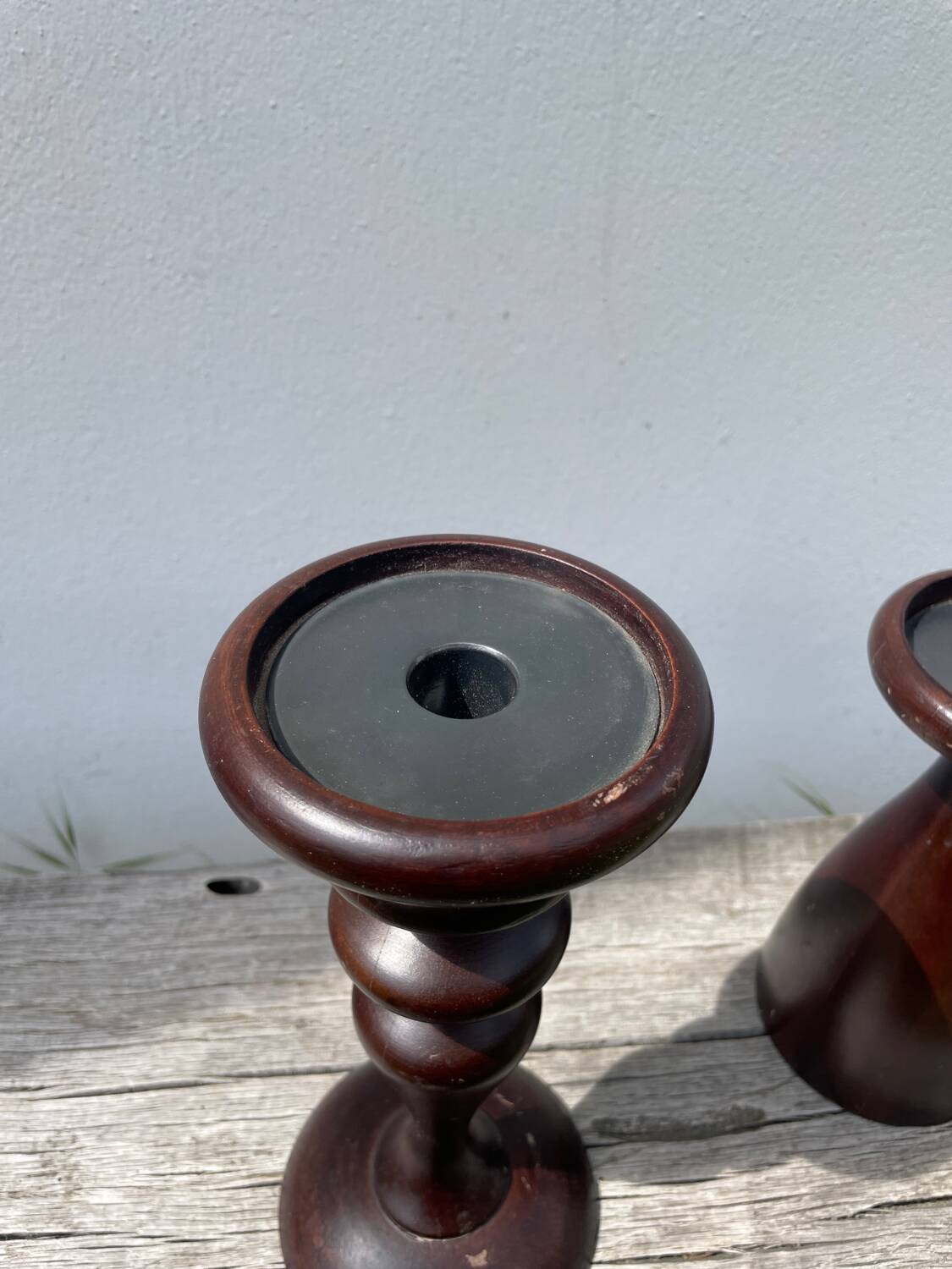 Trio of large turned wooden candlesticks