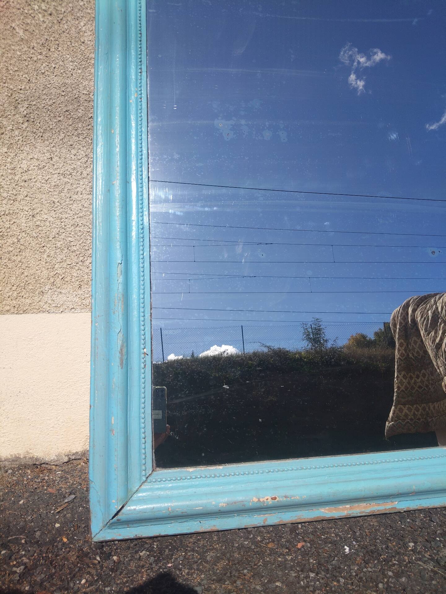 Large Louis-Philippe mirror from the 19th century in wood and stucco with a turquoise blue patina.