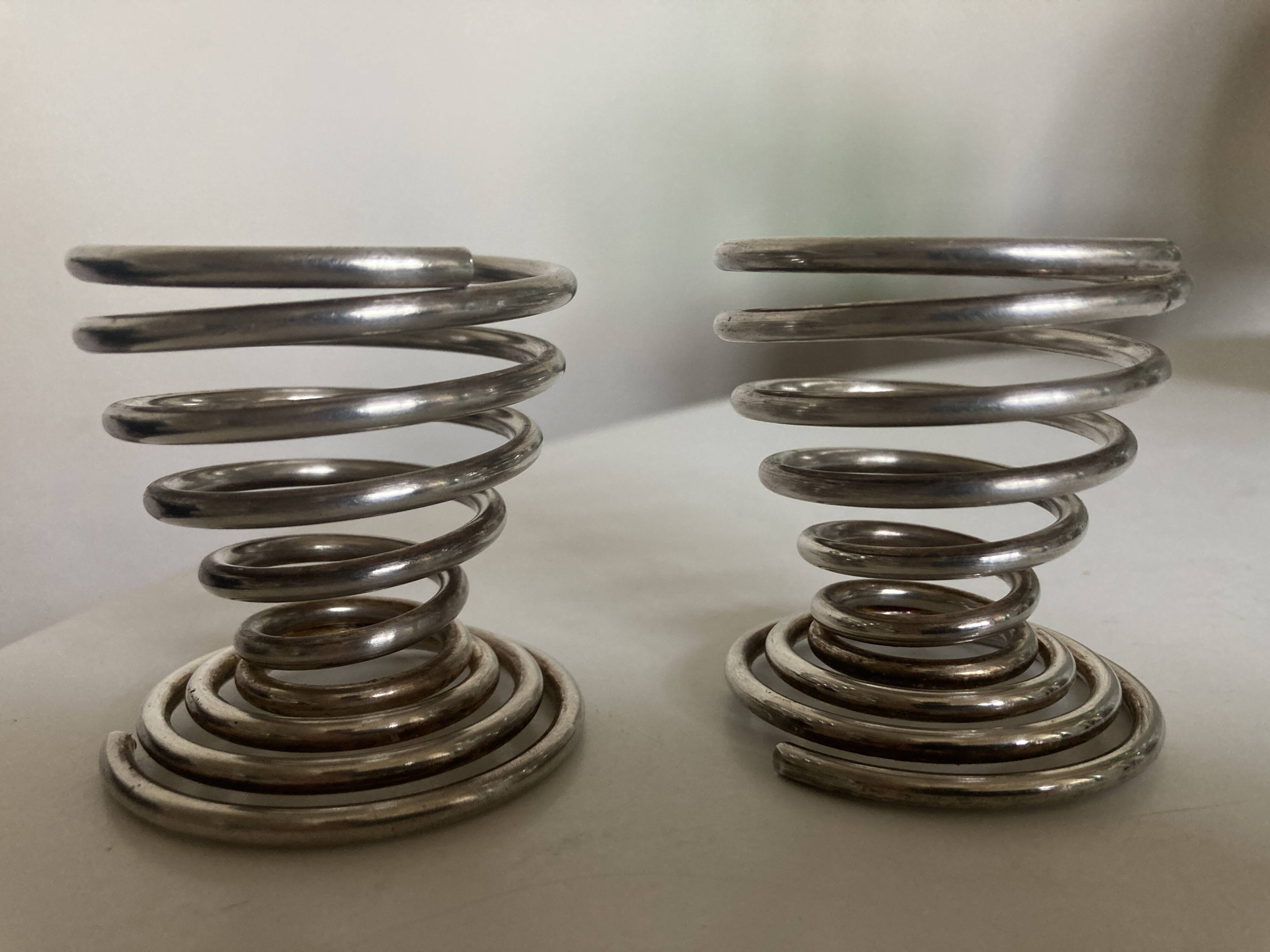 Pair of spring egg cups in silver metal 1970