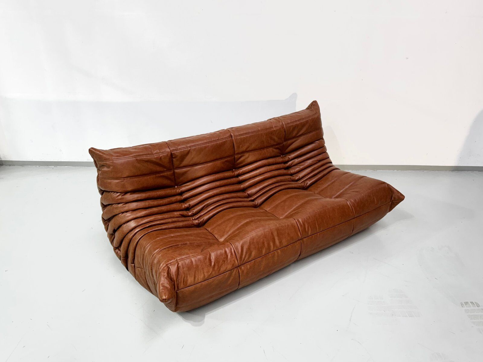 Togo sofa in cognac cowhide by Michel Ducaroy for Ligne Roset.