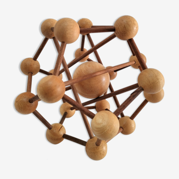 Sculptural modeling of a solid wood atom contemporary design