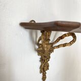baroque shelf in wood and bronze ribbon