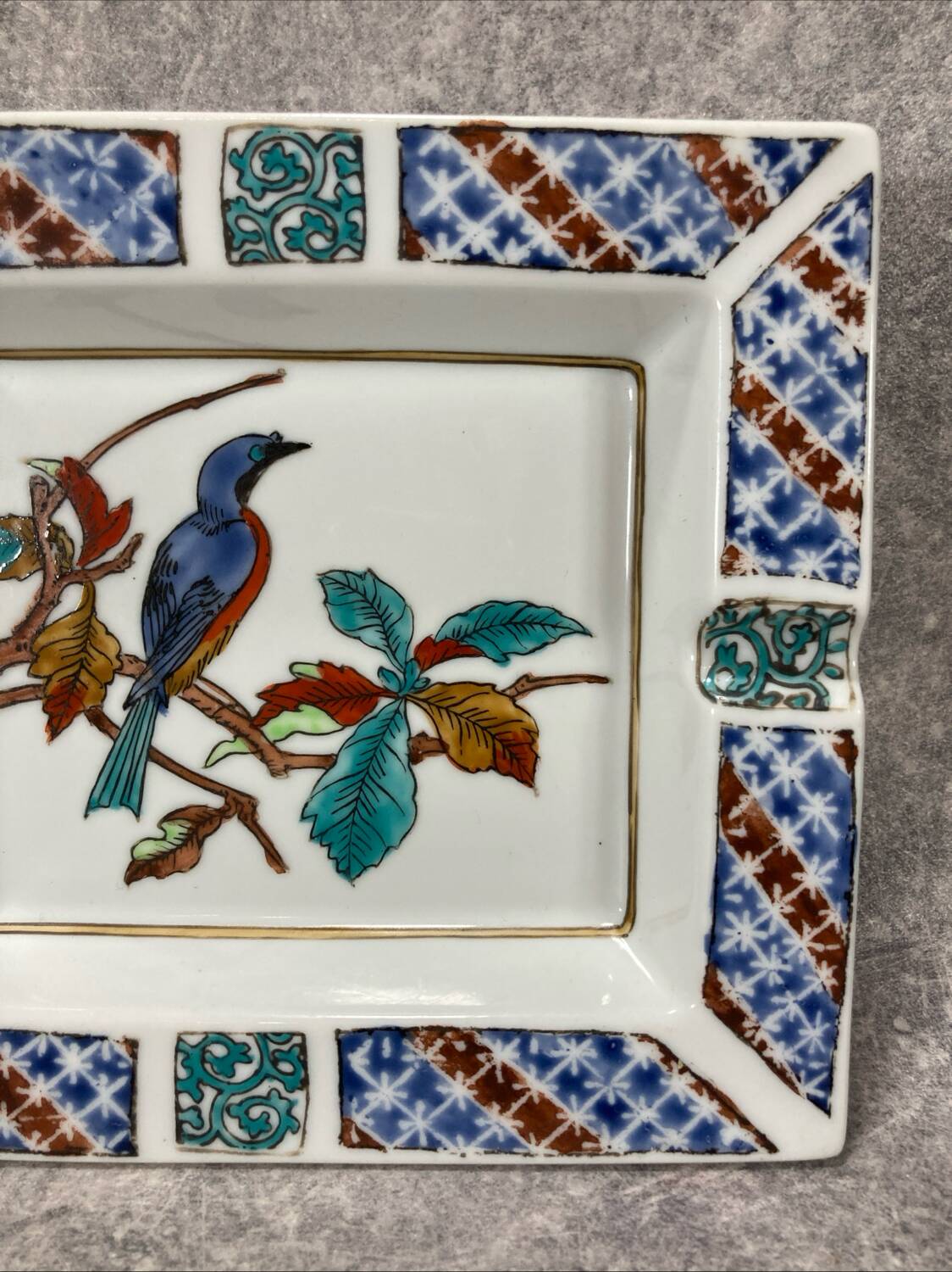 Ashtray. Trinket dish. Japanese porcelain. Blue bird on an autumn branch