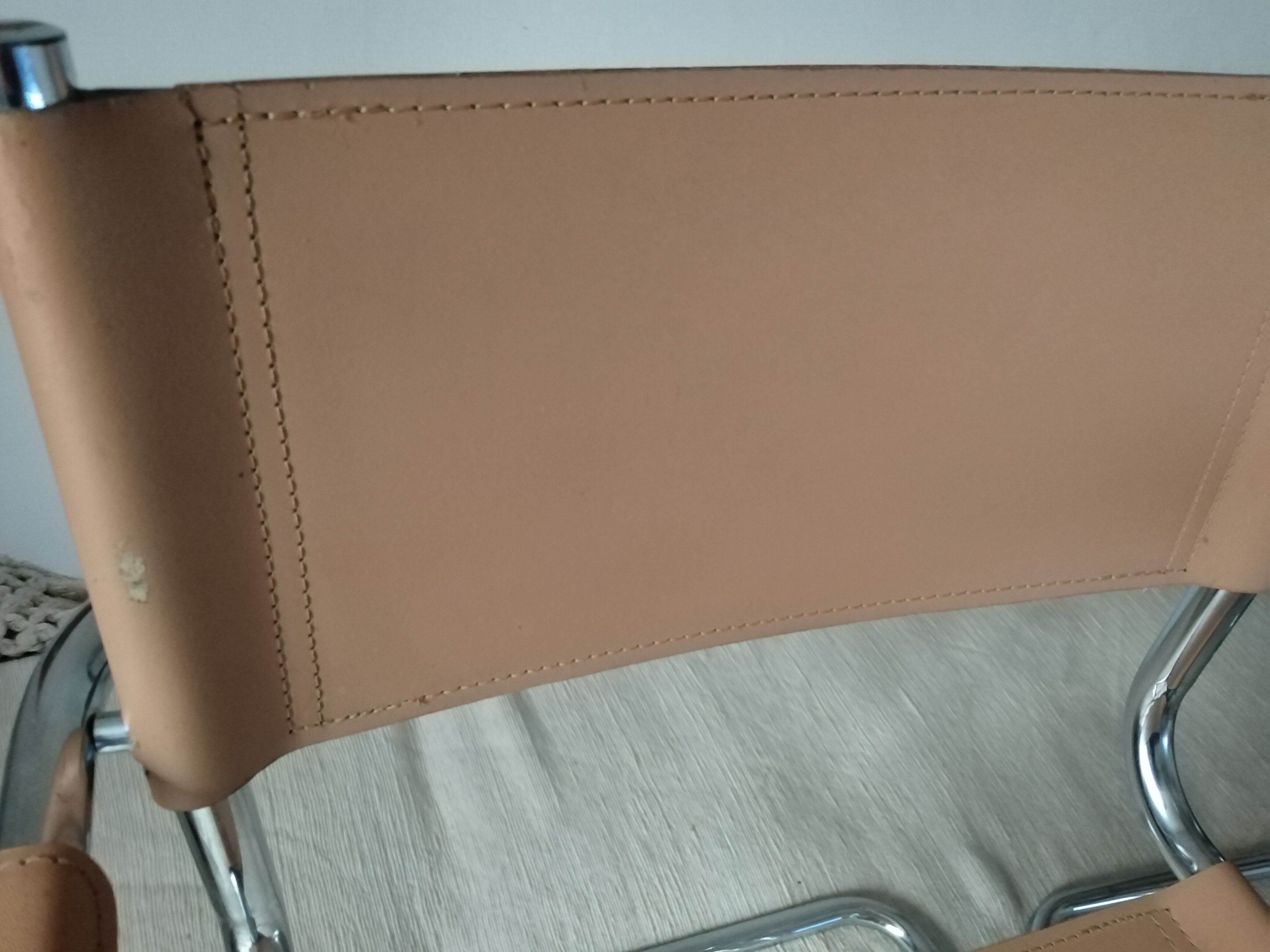 Pair of leather and chrome armchairs