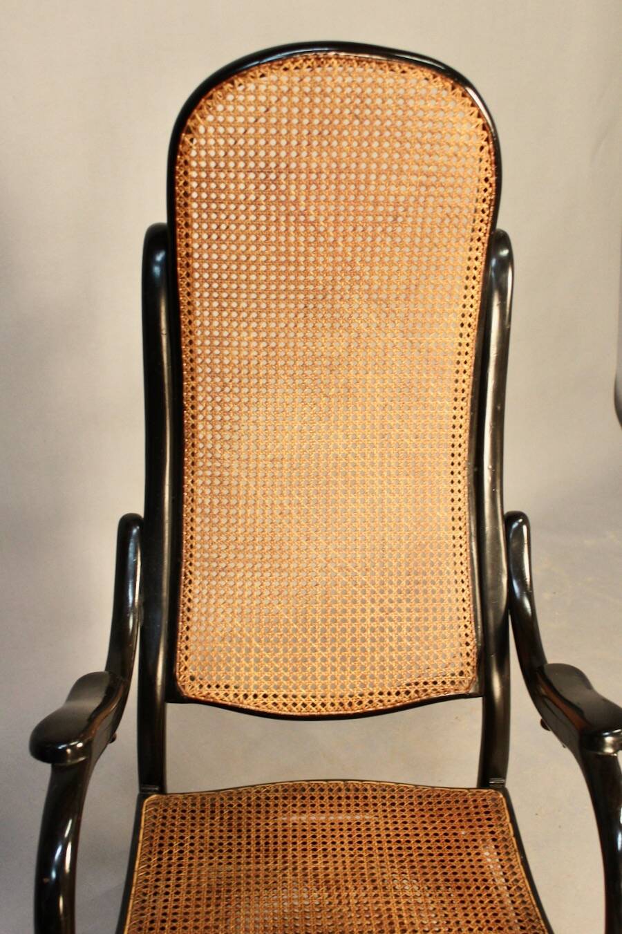 Bentwood cane armchair with mechanism and footrest