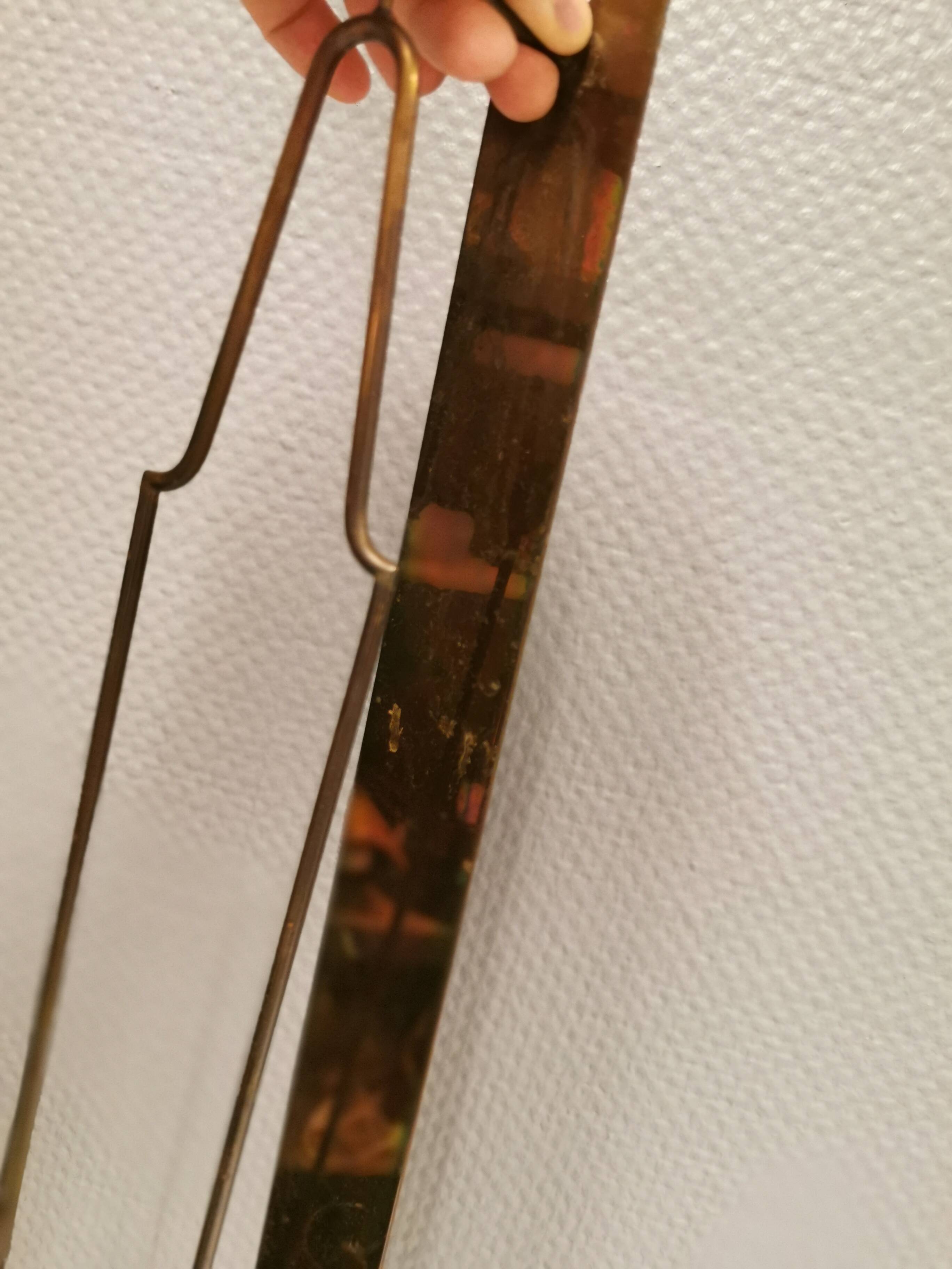 Old Wall hung brass candle holder.