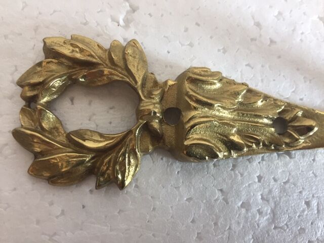 Former bronze patère