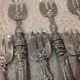 11 silver oyster forks, 800 Minerva style, Louis Philippe