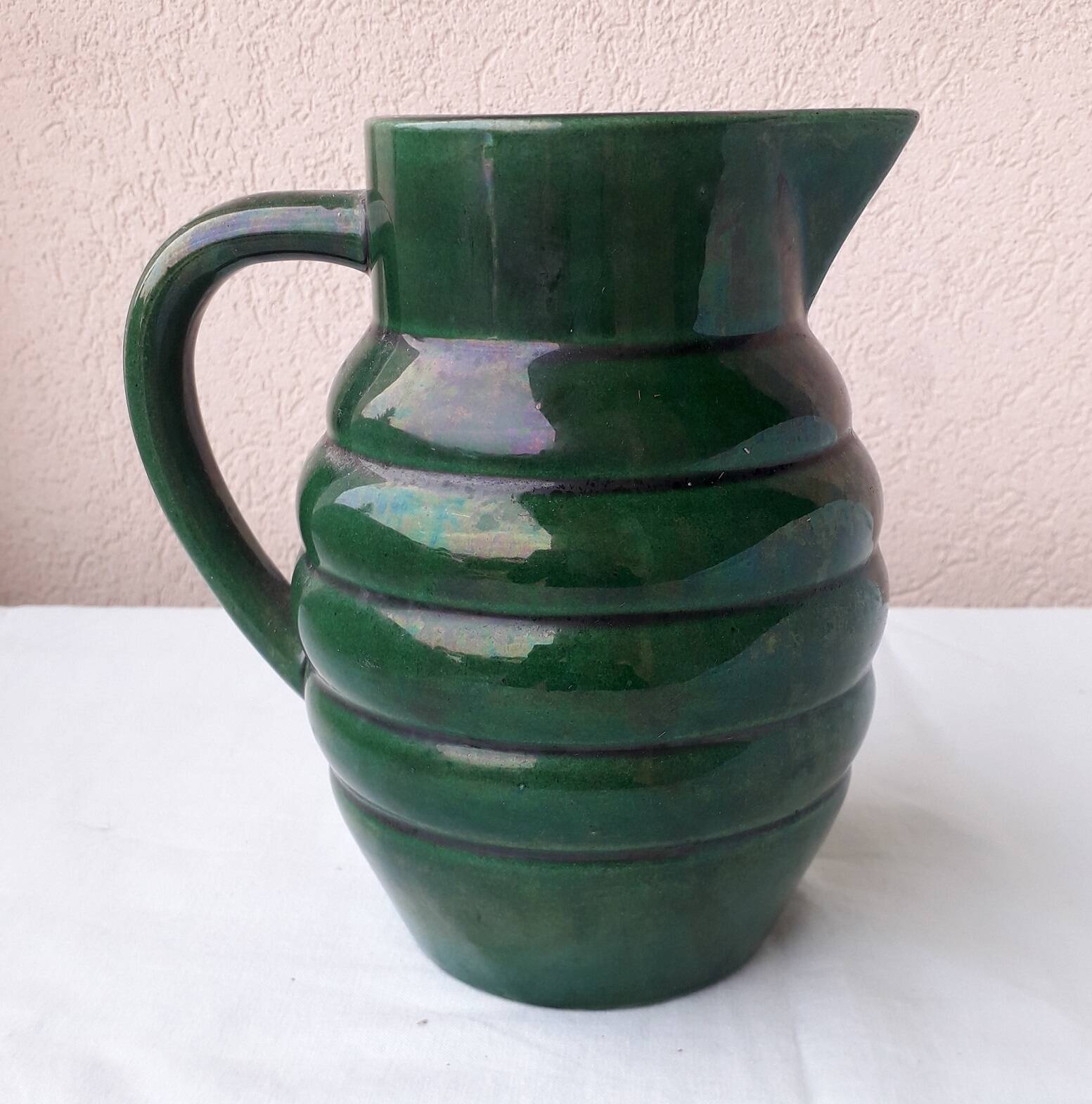 Green ceramic pitcher