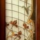 Pair of art deco doors in glass painted in imitation of 20th century stained glass