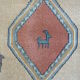 Pair of 60 x 120 Peruvian wool rugs