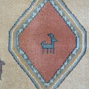 Pair of 60 x 120 Peruvian wool rugs