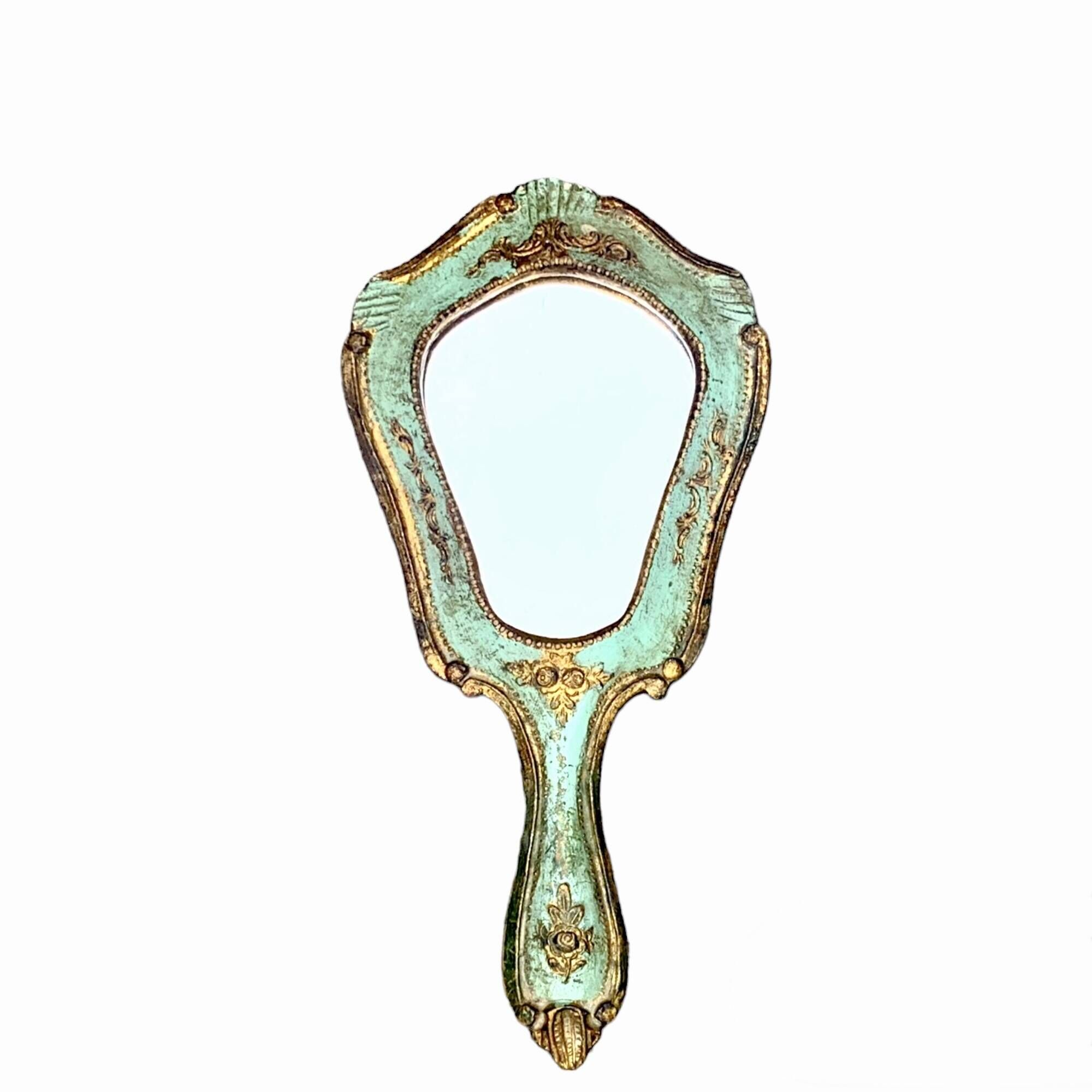 Old Florentine style carved wooden hand mirror