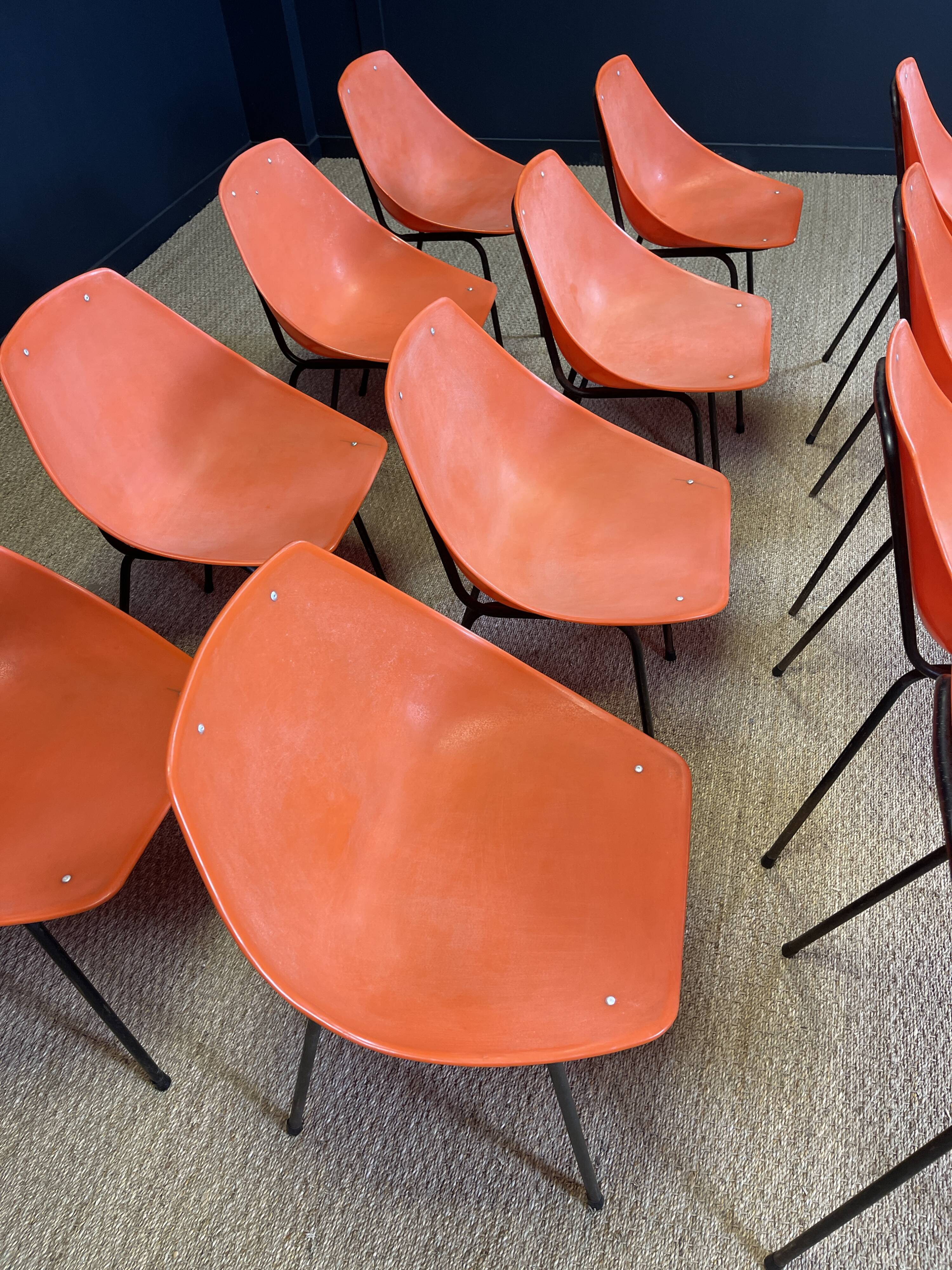 Set of 12 orange Guariche chairs