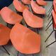 Set of 12 orange Guariche chairs