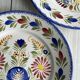2 decorative plates in Quimper earthenware, signed HB Henriot.