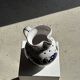 Very large vintage ceramic carafe in white glazed with blue floral decoration.