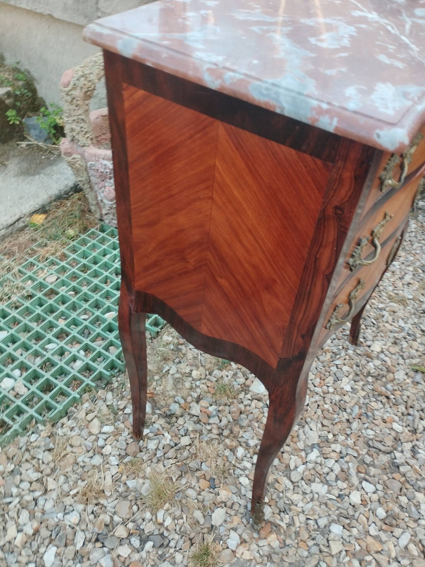 Antique marquetry commode with marble top in Louis XVI style.