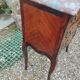 Antique marquetry commode with marble top in Louis XVI style.