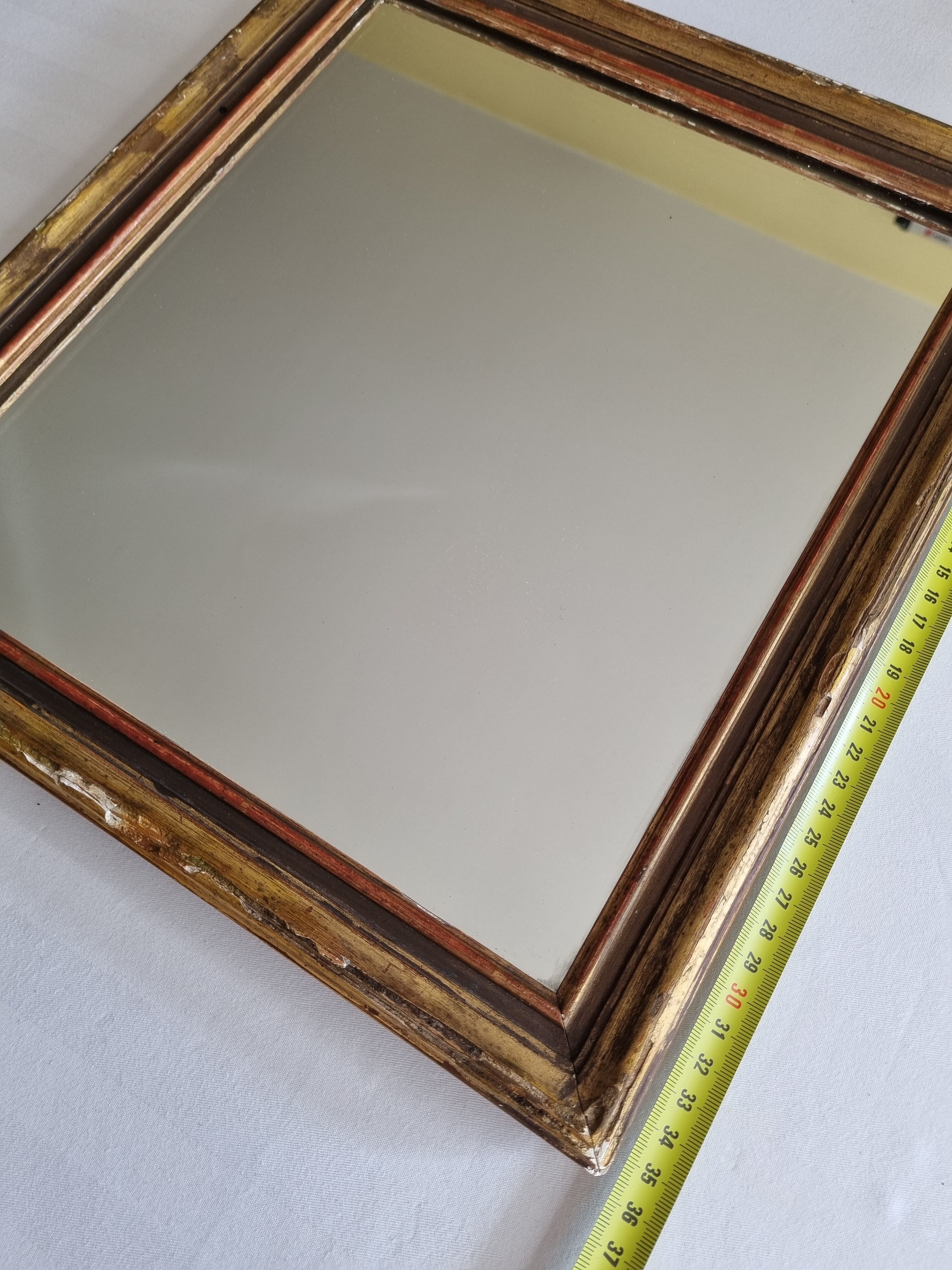 Old rectangular mirror in stucco and wood, 36 cm