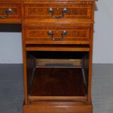 Partner desk in burr walnut designed to conceal computer equipment.