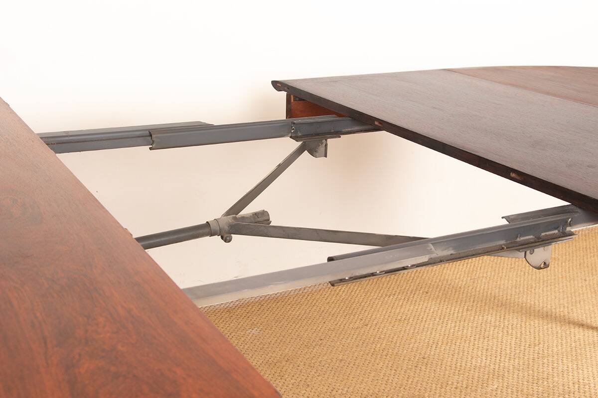 Danish extendable dining table in rosewood by Kai Lyngfeldt Larsen.