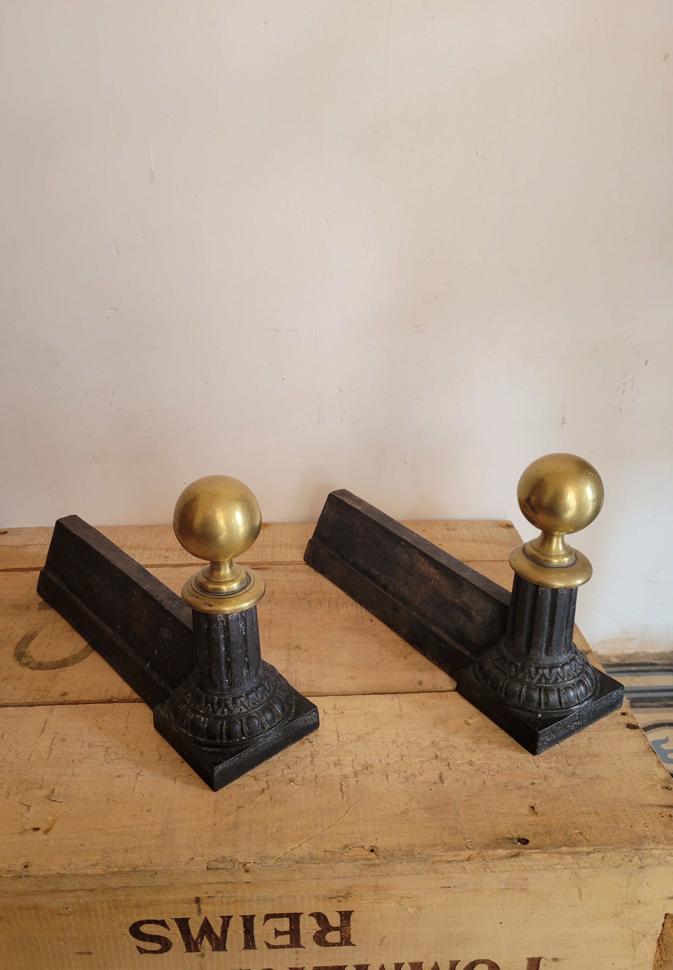 Pair of cast iron and brass chenets