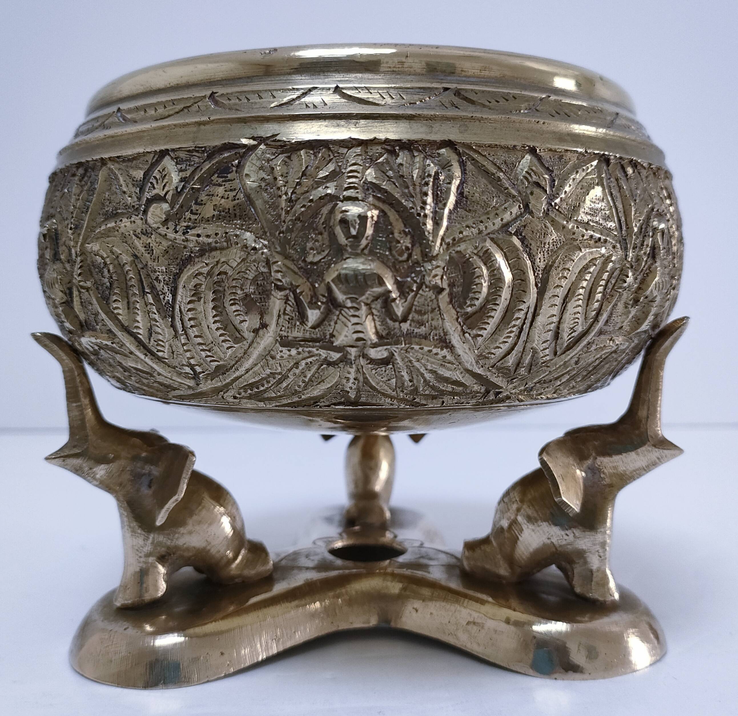 Solid brass elephant pocket emptier from the 80s