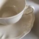Set of 4 cups breakfasts in faience Sarreguemines ivory to godrons