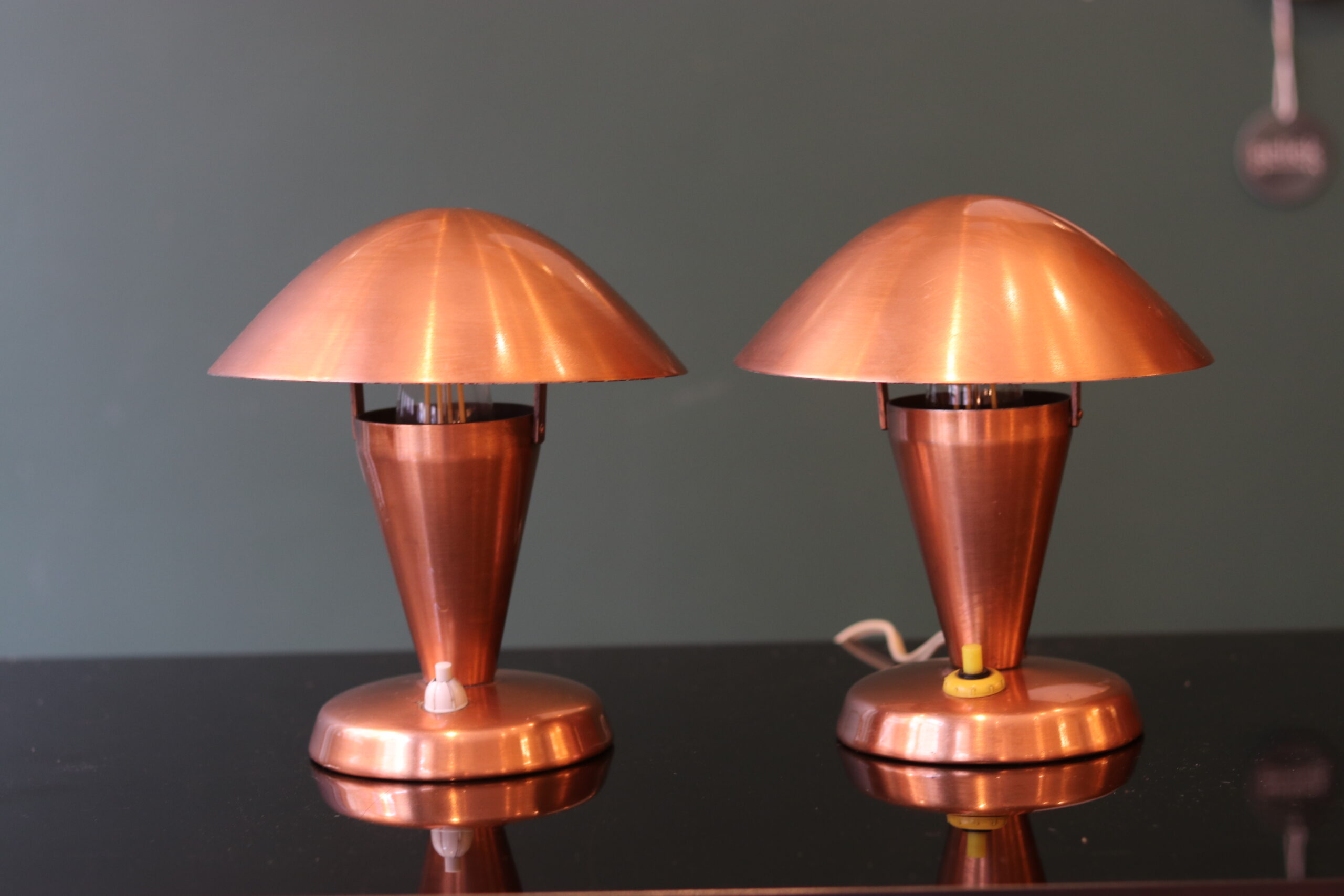Pair of Bauhaus style mushroom lamps in copper metal.
