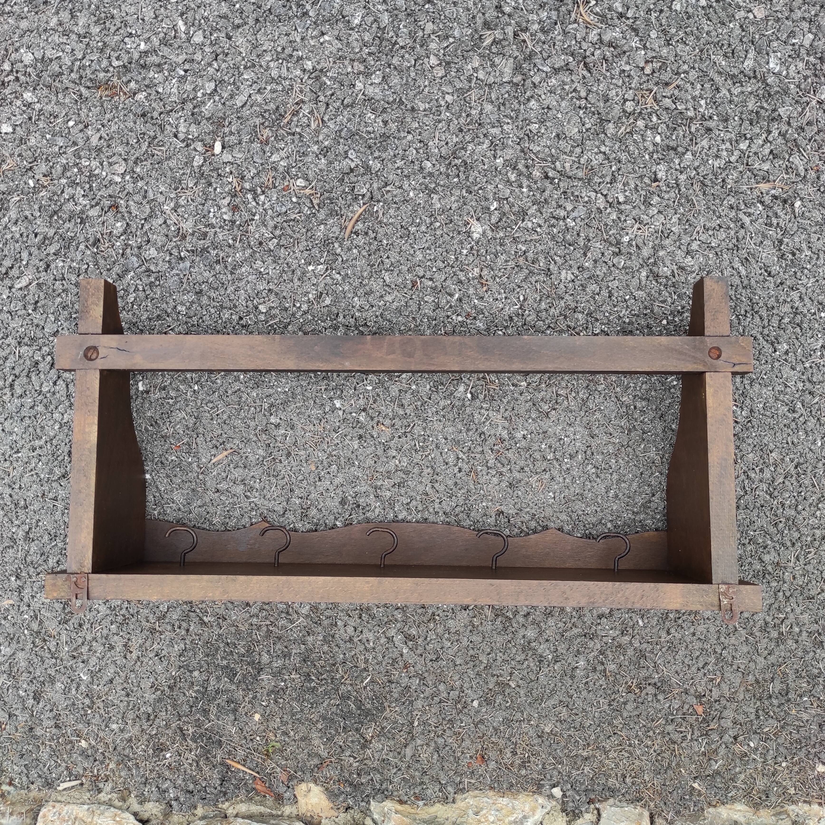 Wall shelf pan holder