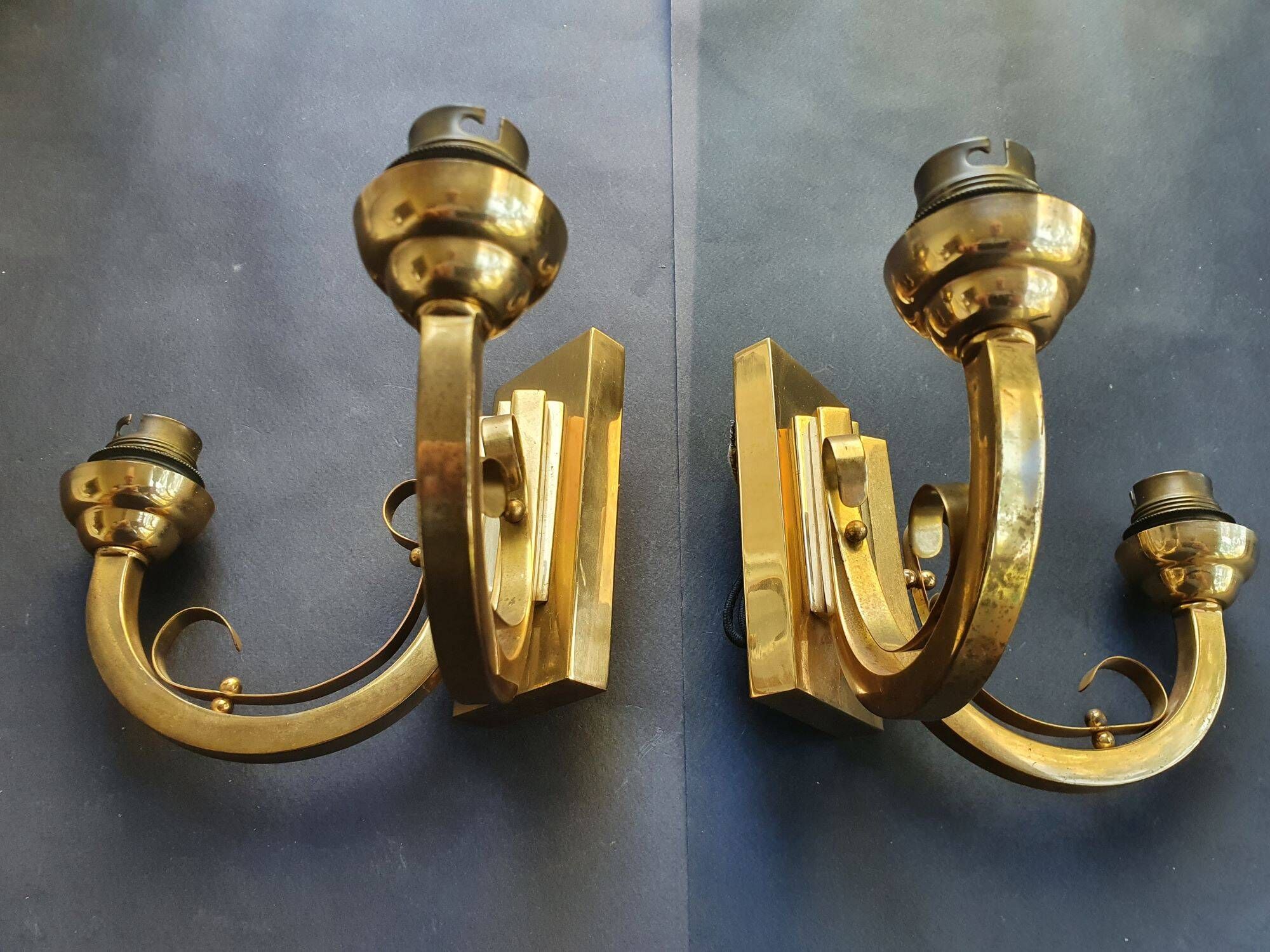 Pair of bronze wall sconces with 1940s Art Deco lampshades.