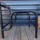 Duo de fauteuils noirs "grillage" en métal