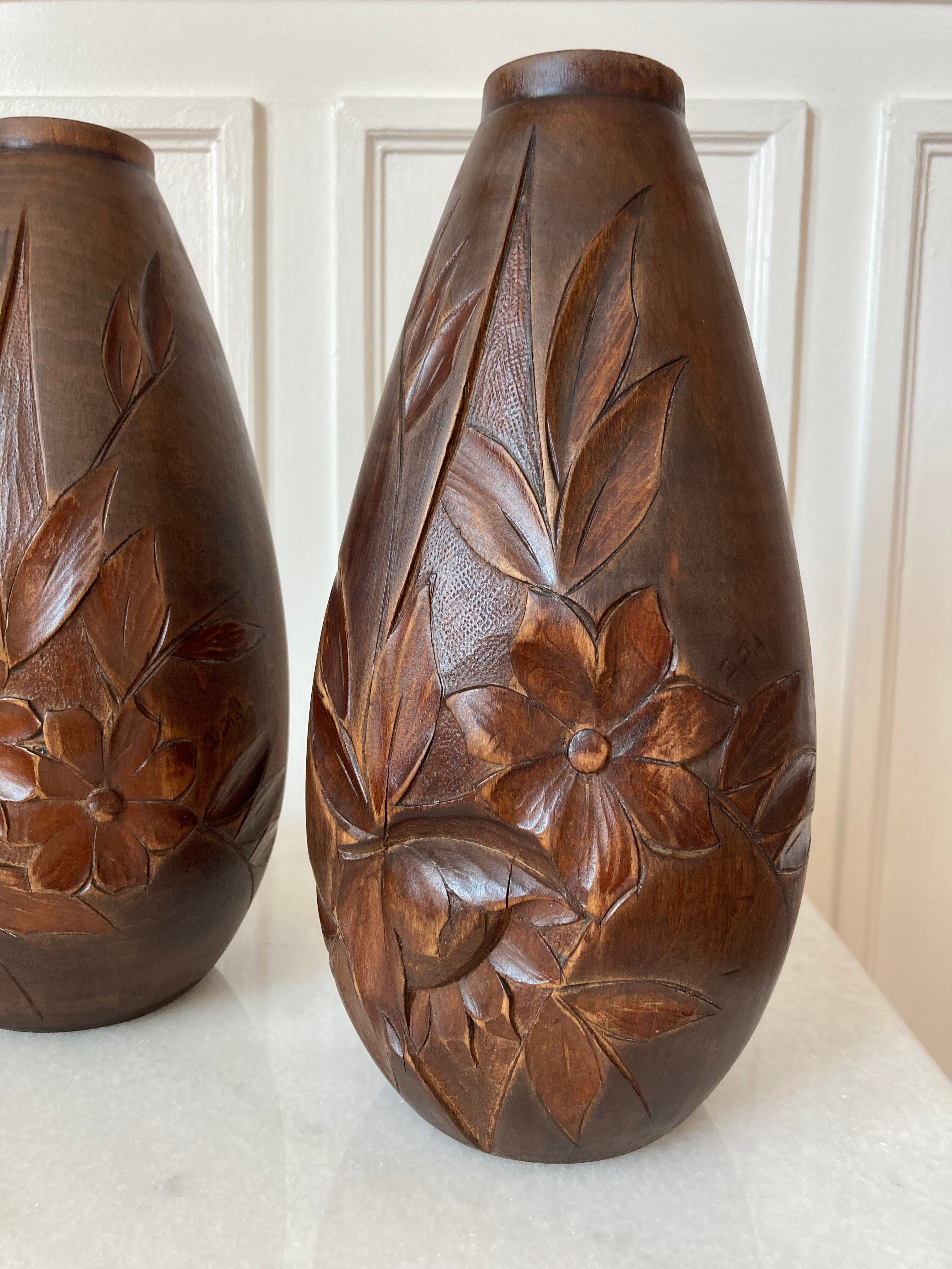 Pair of Art Deco carved wooden vases