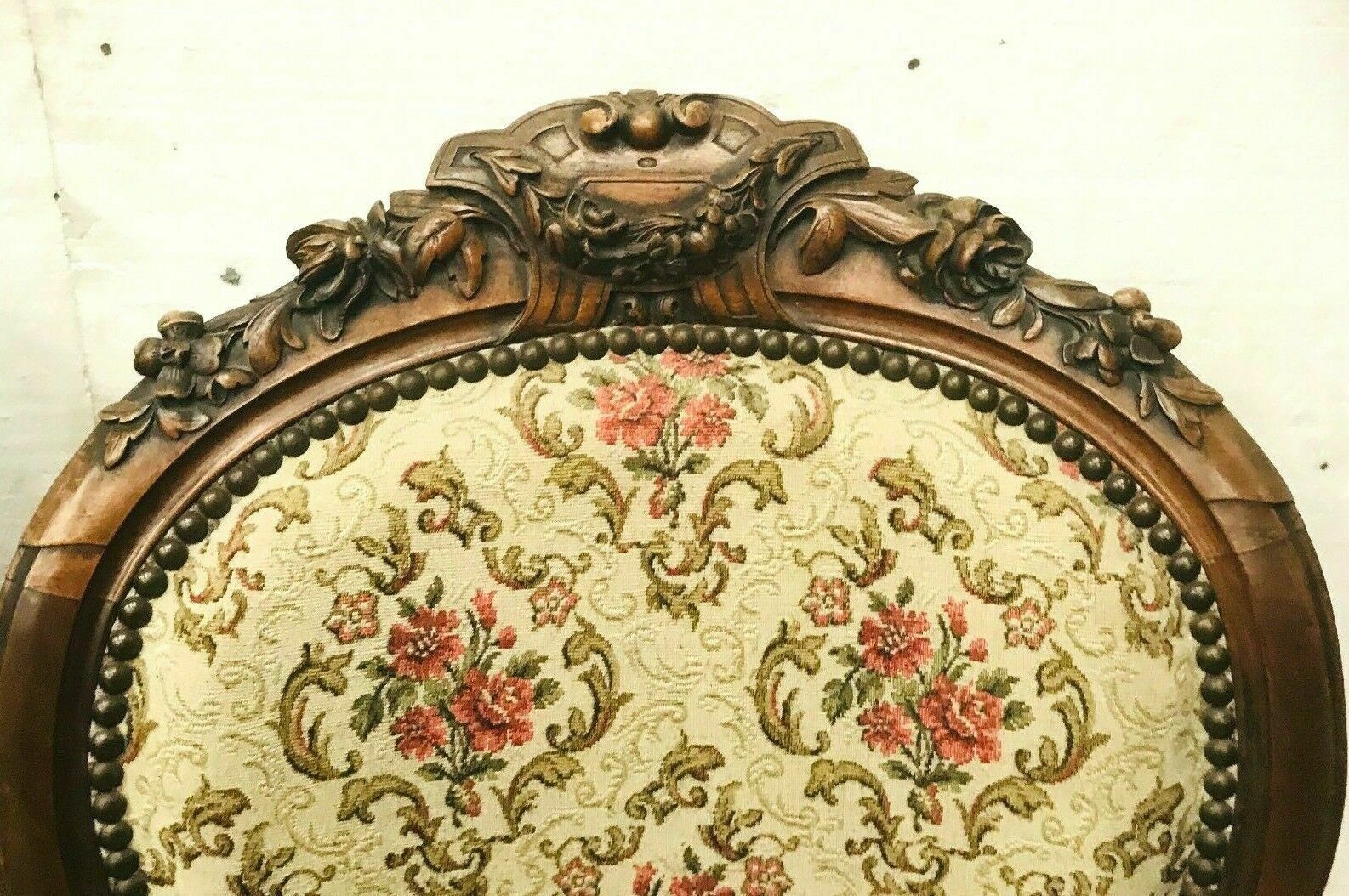 Pair of Napoleon III chairs in 19th century carved mahogany