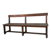 Large wooden bench with a backrest