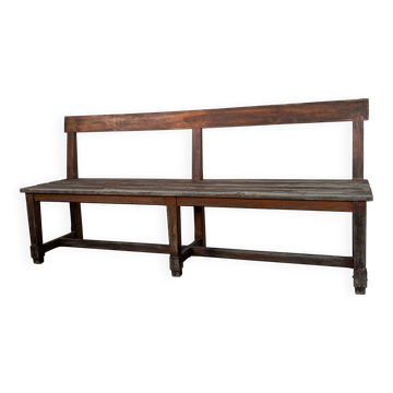 Large wooden bench with a backrest