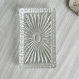 Metal butter dish and thick rectangular glass bowl.