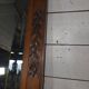 Bevelled mirror in carved wood